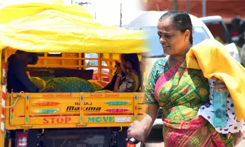 People protecting themselves from the searing heat in  Vijayawada on MondayPhotos: Ch Venkata Mastan