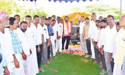 Minster V Srinivas Goud laying foundation stone for a bridge in Hanwada mandal on Monday