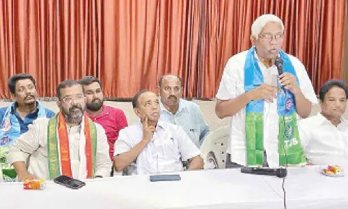 Telangana Jana Samithi (TJS) chief Prof. Kodandaram speaking at a round table conference in Hanumakonda on Monday