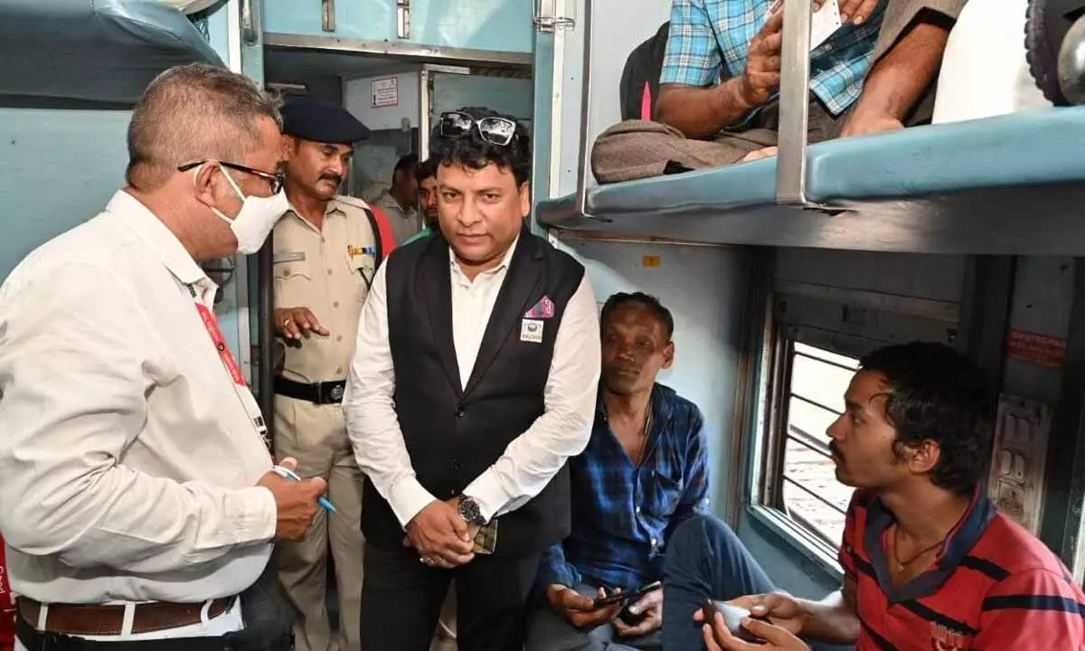 DRM Anup Satpathy during one of his surprise ticket checking inspections onboard Prashanti express