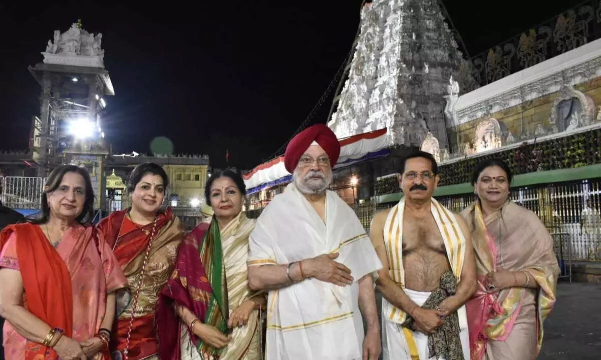 Union minister Hardeep Singh Puri with his family members after having darshan at Tirumala temple on Tuesday morning