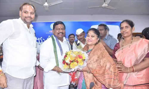 Dy CM P Rajanna Dora, Chinna Srinu and others felicitating collector A Suryakumari in ZP general body meeting