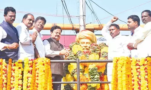 District  Collector  K Venkataramana Reddy, MLC  Dr Cipai  Subrahmanyam and others  paying tributes  to Mahatma Jyotirao Phule in Tirupati on Tuesday