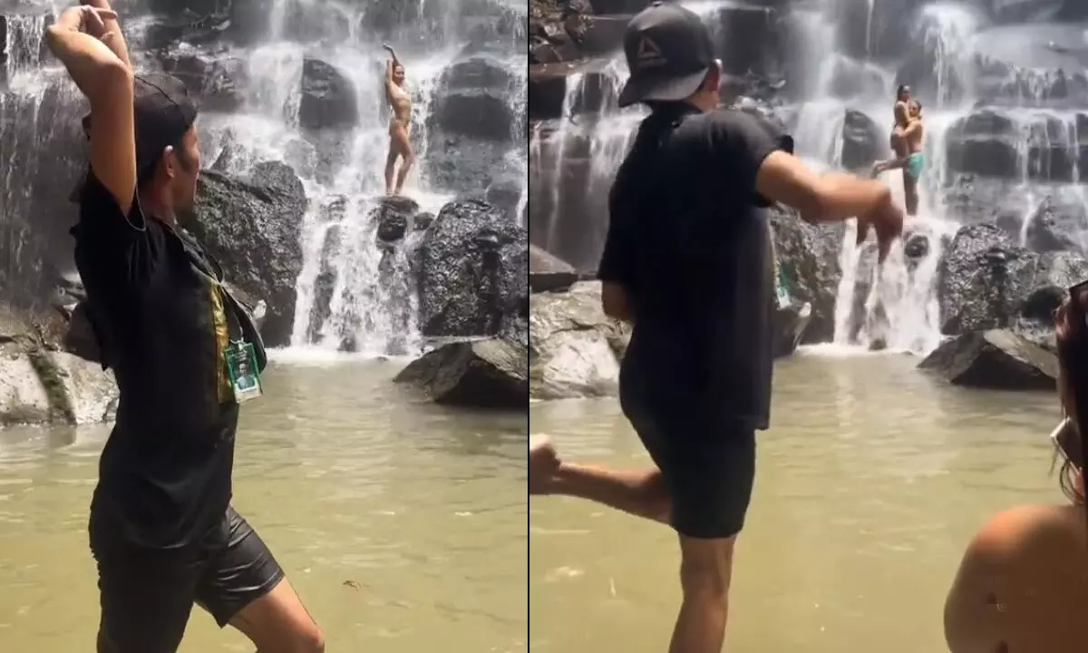 Watch The Trending Video Of Bali Tour Guide Helping Couple To Pose