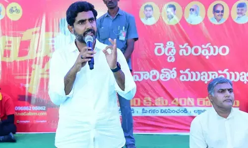 TDP national general secretary Nara Lokesh talking to Reddy community members in Tadipatri on Wednesday