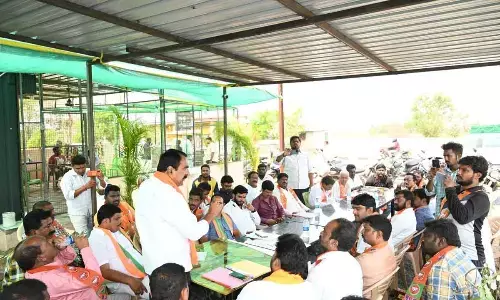 Warangal Urban Cooperative Bank chairman Errabelli Pradeep Rao speaking to the youth ahead of BJPs April 15 Nirudyoga March in Warangal on Wednesday