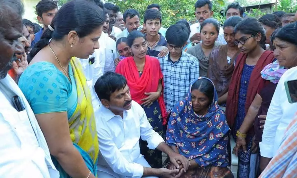 Former MP Ponguleti Srinivas Reddy consoling fire accident victims at Cheemalapadu in Khammam district on Friday.