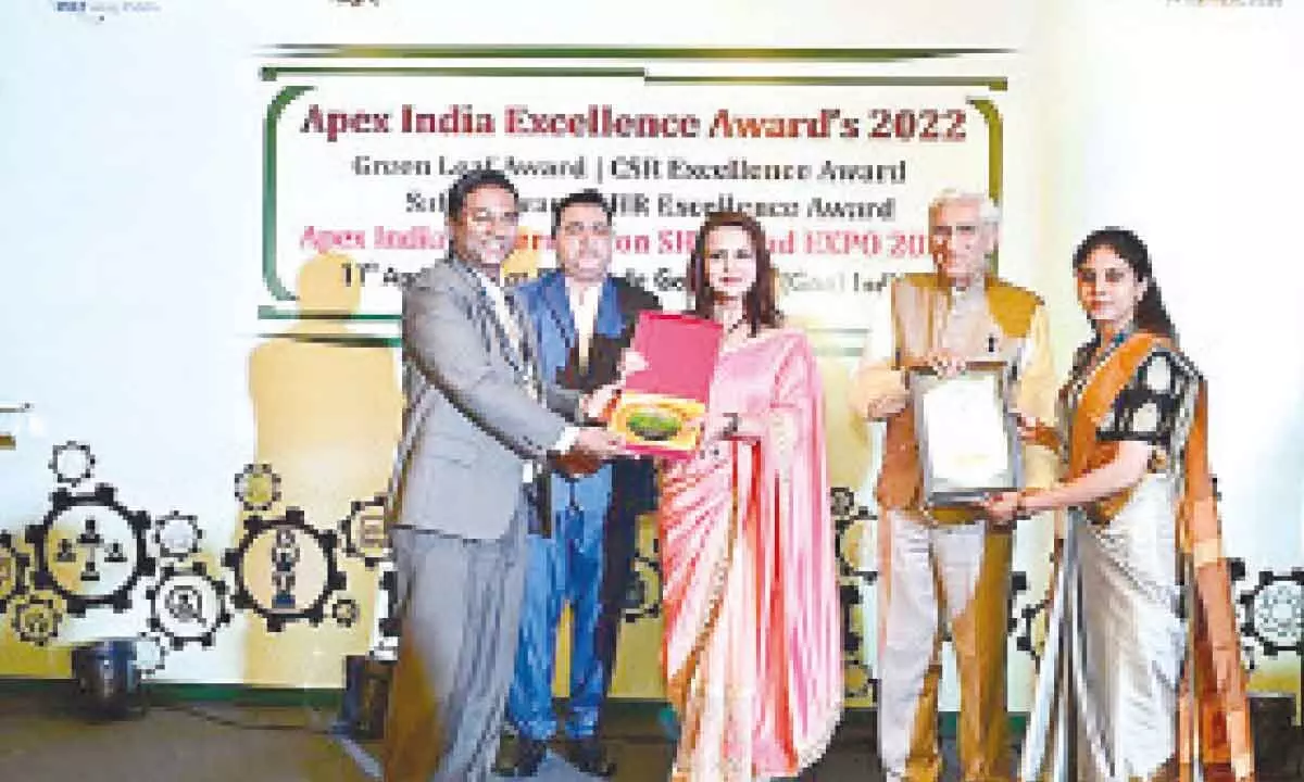BIAC officials receiving ‘Platinum Award’ as a part of the ‘Apex India Green Leaf Award for Sustainability’ for the year 2022