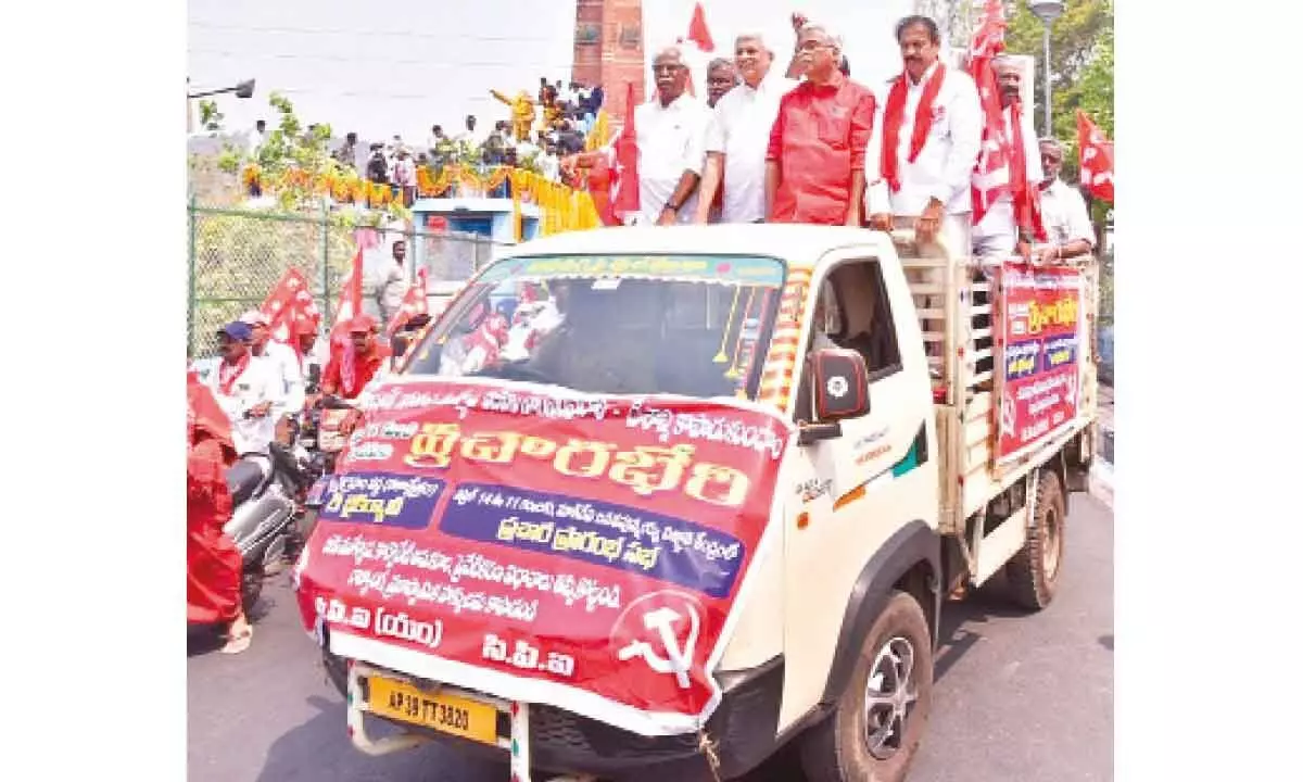 CPM politburo member Prakash Karat, CPI national secretary and MP Binoy Viswam participating in Prachara Bheri campaign in Vijayawada on Friday
