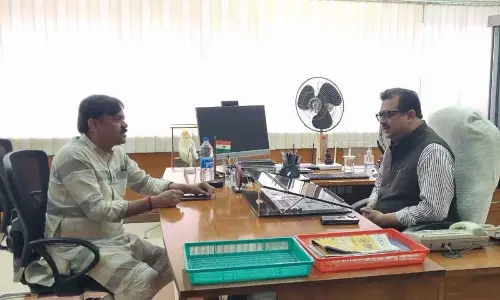 BJP MP GVL Narasimha Rao discussing with RINL CMD Atul Bhatt in Visakhapatnam on Friday