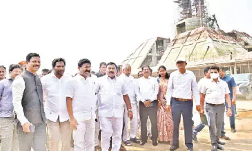 Ministers Merugu Nagarjuna and Audimulapu Suresh inspect the ongoing Ambedkar Smriti Vanam works in Vijayawada on Friday