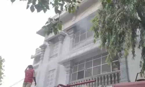 Fire personnel dousing the flames at Asthana Mandapam in Tirumala on Sunday