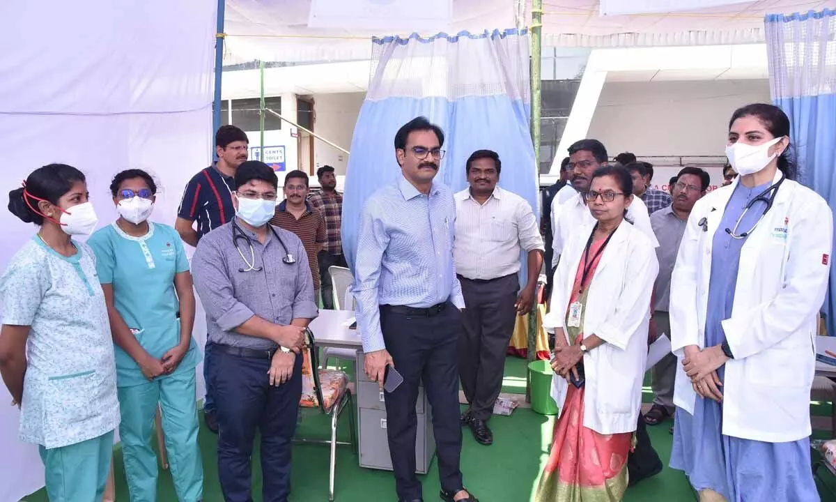 District Collector M Venugopal Reddy at a health checkup programme at AS Sankaran Hall at the Collectorate in Guntur city on Sunday. GGH Superintendent Dr G Prabhavati is also seen.