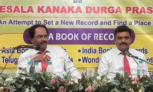 Comedy duo Pesala Kanaka Durga Prasad and Vemula Bhaskarachari during a 12-hour-long non-stop comedy show held in Visakhapatnam on Sunday