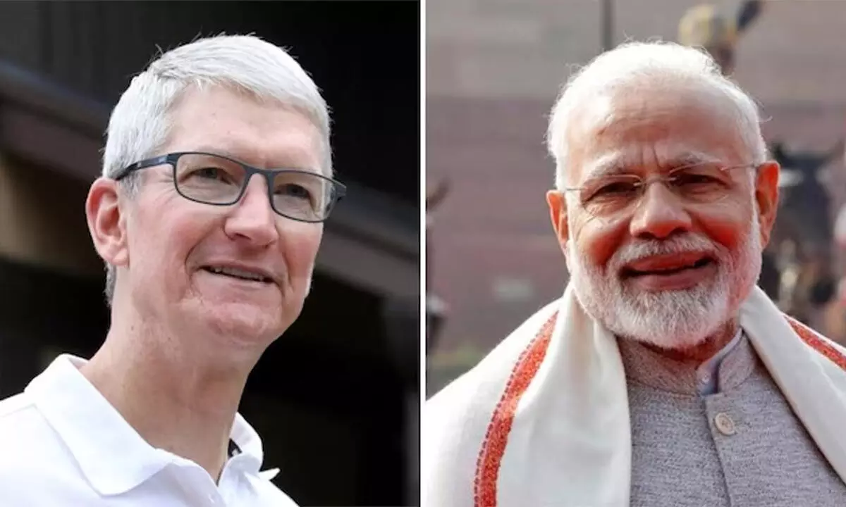 Apple Chief Executive Tim Cook and Prime Minister Narendra Modi