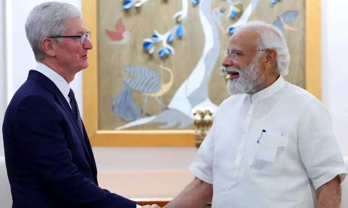 Apple CEO Tim Cook and Prime Minister Narendra Modi