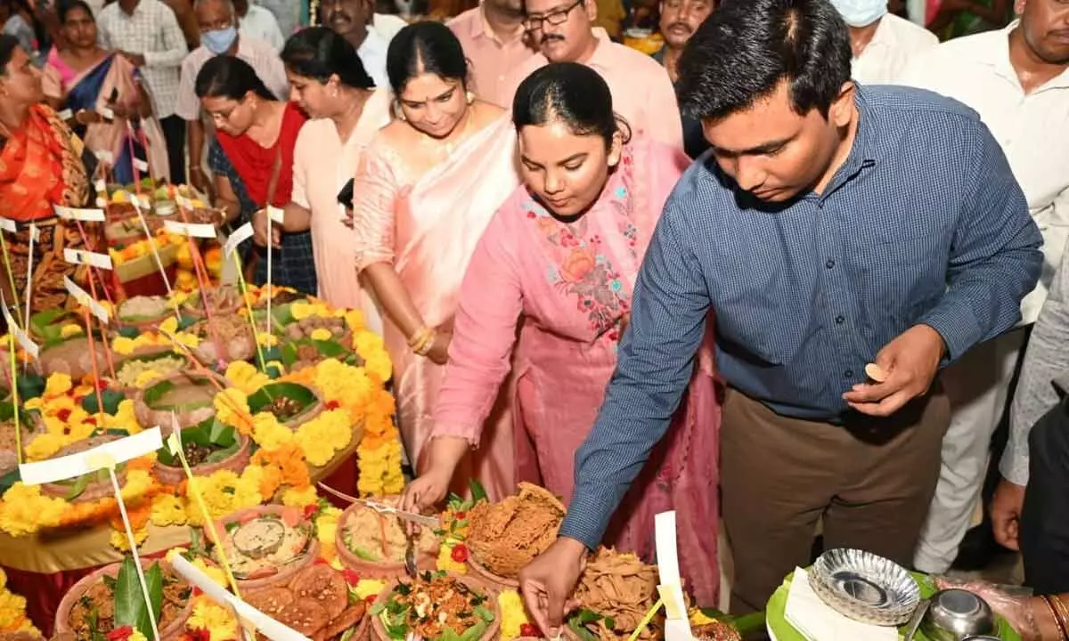 District Collector  S Shanmohan tasting a dish prepared with millets  at Millets Food Festival in  Chittoor on Wednesday
