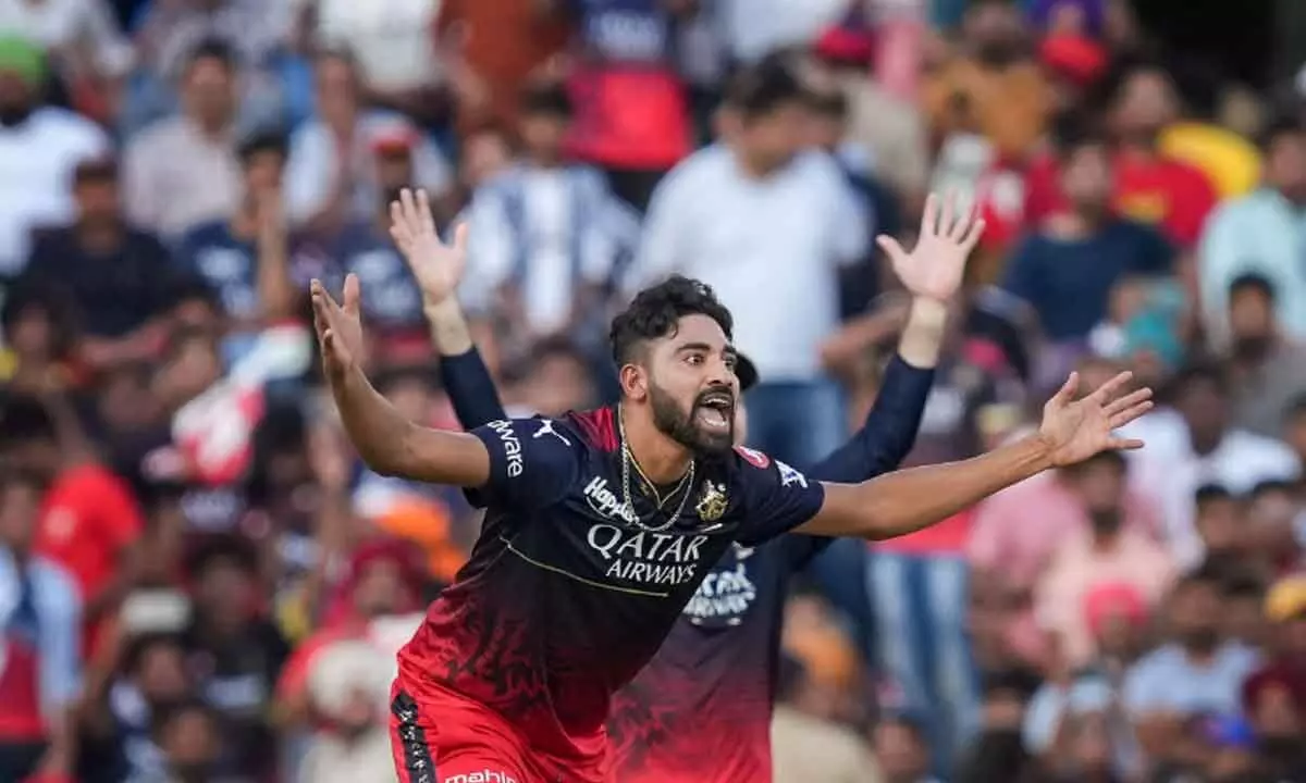 RCB bowler Mohammed Siraj successfully appeals agains Punjab Kings batter Atharva Taide during the IPL 2023 at Punjab Cricket Association Stadium in Mohali on Thursday