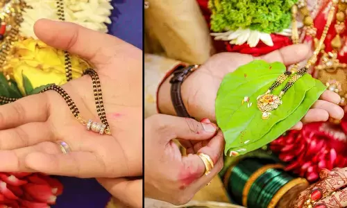 The Bride’s Mangalsutra is tied around her neck by the groom as a sign of their sacred union on the day of their holy wedding