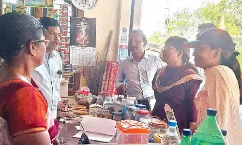 Additional Collector Snehalatha Mogili interacting with Dalit Bandhu beneficiaries at Chintakani in Khammam district on Thursday.