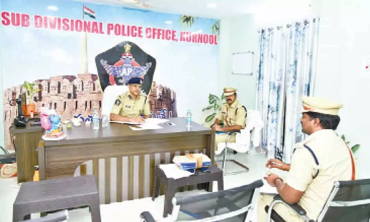 Kurnool Range DIG S Senthil Kumar inspecting the records at DSP office on Friday. SP G Krishna Kanth and DSP KV Mahesh are also seen.