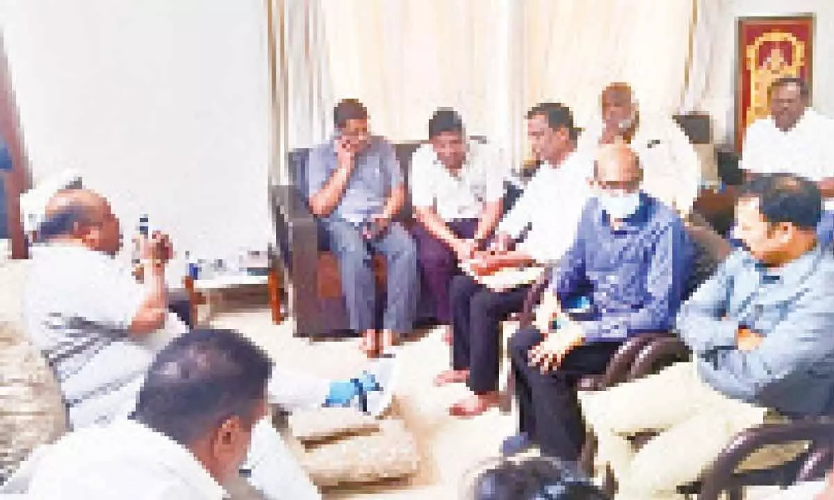 Civil Supplies Minister Gangula Kamalakar during a review meeting at his residence in Karimnagar on Friday