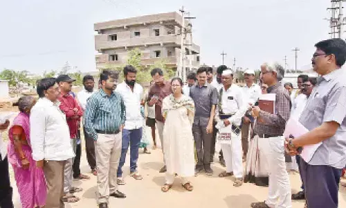 Collector Nagalakshmi, Joint collector Mayur Ashok visiting rehabilitation colony in  Bhogapuram on Friday