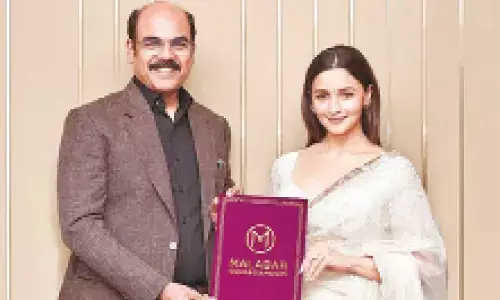 Actress Alia Bhatt with managing director - India of Malabar Gold and Diamonds Asher O