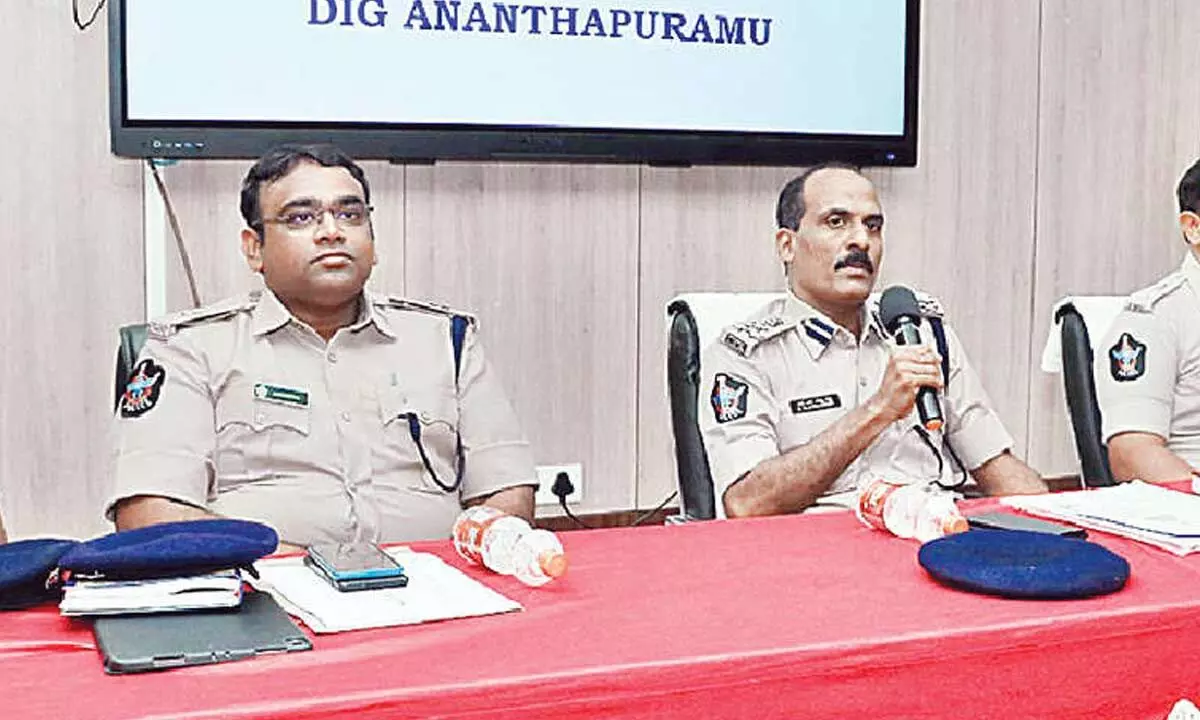 Anantapur Range DIG RN Ammi Reddy speaking to the police officers in Tirupati on Sunday. SP P Parameswar Reddy, Additional SPs Kulasekhar, Vimalka Kumari, Muni Ramaiah, SEB Joint Director Rajendra and others are seen.