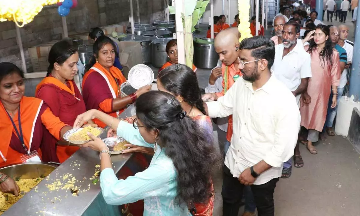 Srivari Sevaks distributing Annaprasadam to pilgrims at the newly set up counter at PAC1 at Tirumala on Sunday 