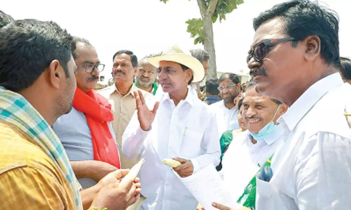 A file photo of Chief Minister K Chandrashekhar Rao interacting with farmers.