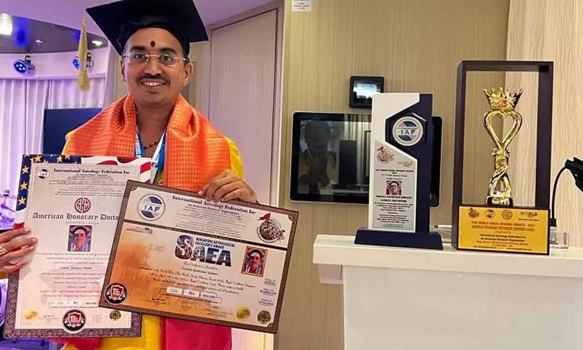 Rajamahendravaram: Astrologer Ravi Kumar awarded honorary doctorate