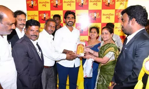 Advocates submitting a  representation to TDP national general secretary Nara Lokesh at Kuppagallu village in Adoni mandal in  Kurnool district on Sunday