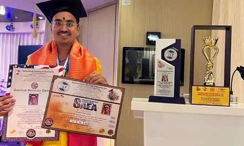 Rajamahendravaram: Astrologer Ravi Kumar awarded honorary doctorate