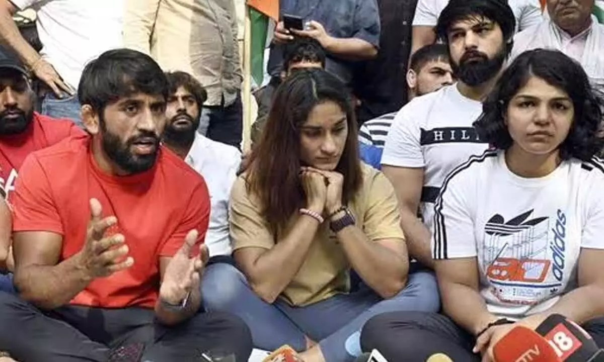 The wrestlers addressing a press conference during their protest against the Wrestling Federation of India in New Delhi.
