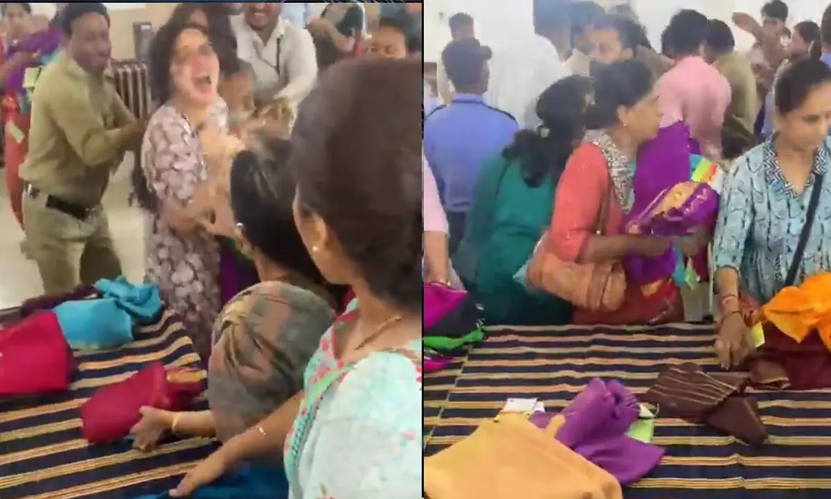 A brawl between two women over a saree broke out in the midst of the commotion.