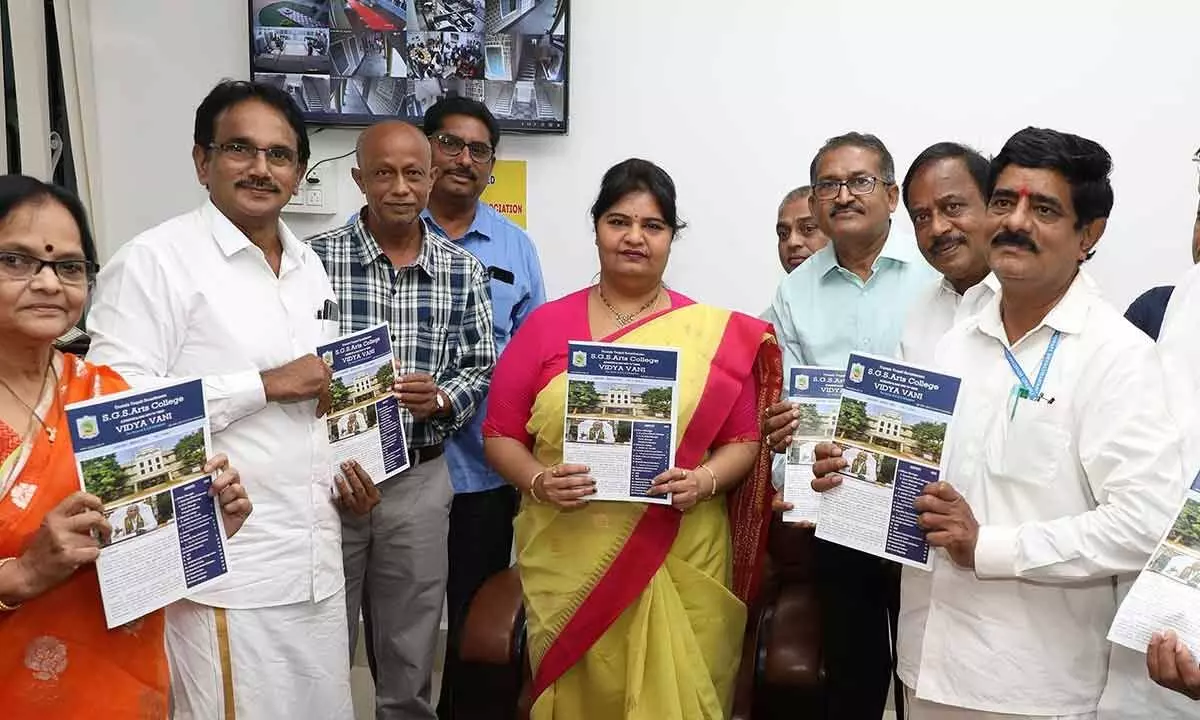TTD JEO Sada Bhargavi who participated in a meeting at SGS Arts College, Tirupati, releasing the newsletter on Tuesday