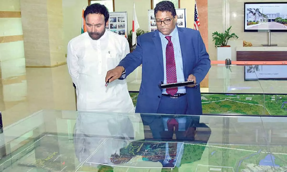 Sri City MD Ravindra Sannareddy briefing Union minister  G Kishan Reddy about the integrated business city on Tuesday