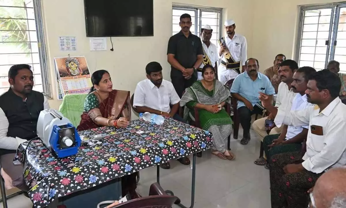 District Collector Dr K Madhavi Latha and Joint Collector N Tej Bharat speaking to the staff at Namavaram Rythu Bharosa Kendra on Tuesday