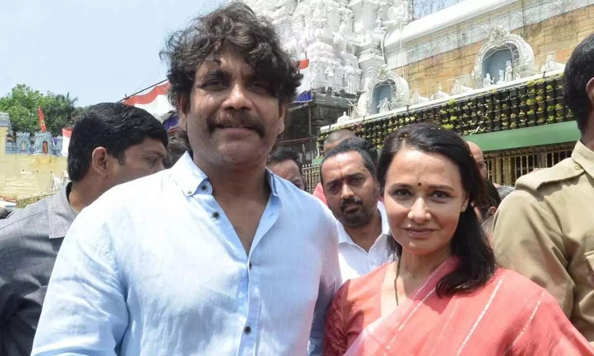 Film star Nagarjuna and his wife Amala at Tirumala on Wednesday