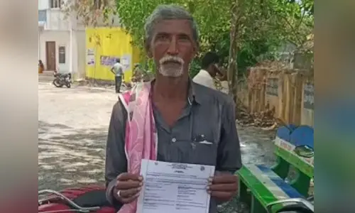 Kankipati Narayana with his death certificate