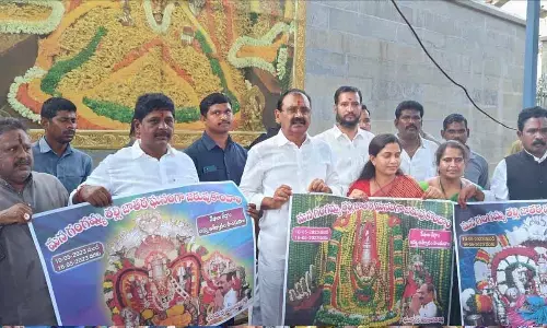 MLA Bhumana Karunakar Reddy, Mayor Dr R Sirisha, Deputy Mayor Mudra Narayana, temple  committee chairman Katta Gopi Yadav and executive officer Munikrishnaiah releasing Jatara  posters at the Gangamma temple premises in Tirupati on Tuesday