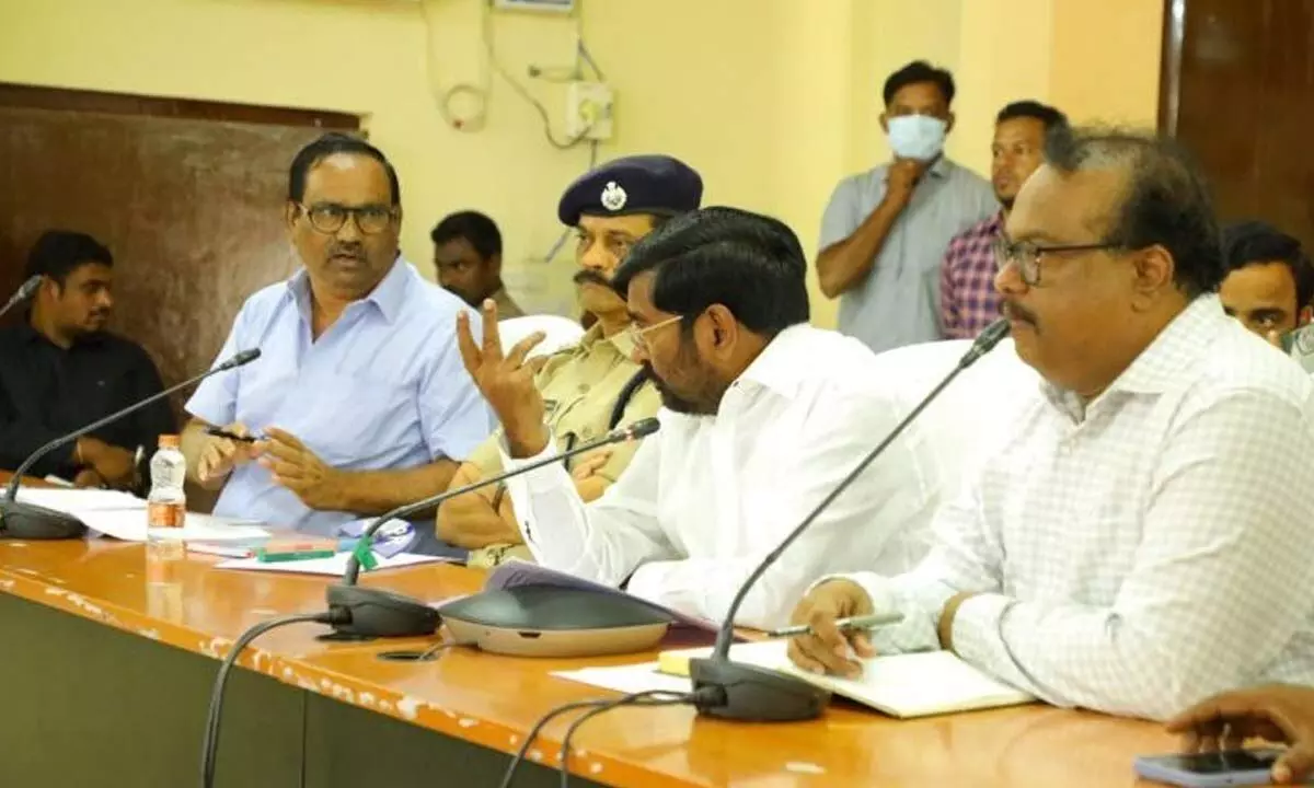 Minister Jagadish Reddy holding a review meeting with officials at the Collectorate in Suryapet on Wednesday