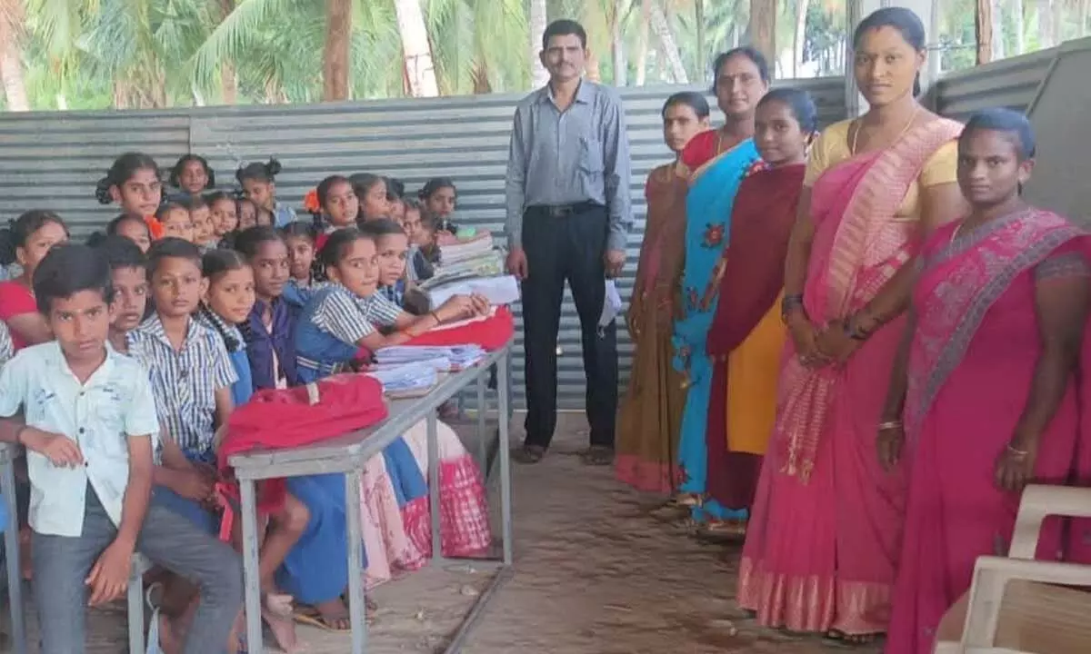 Library Department holding awareness drive for school students on summer training camps at Dharmavaram village in Srikakulam district