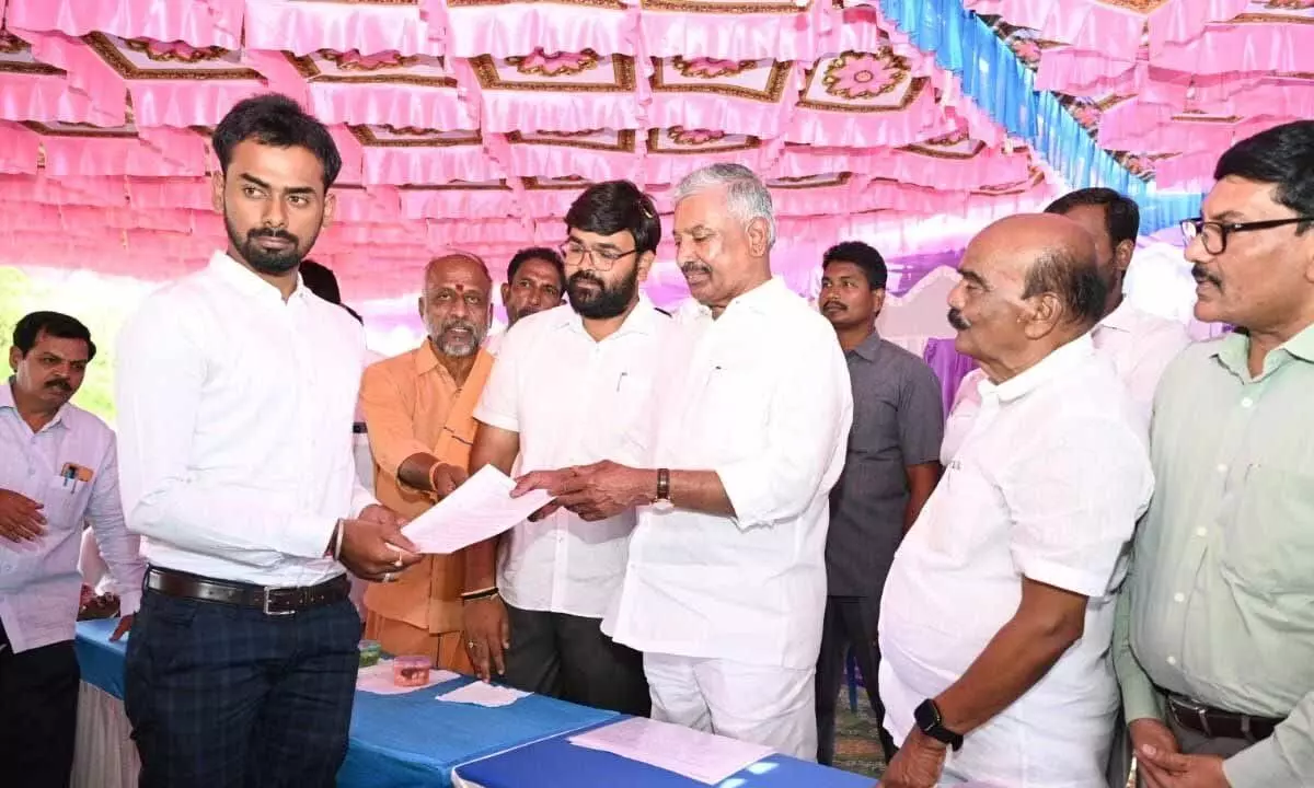 Energy Minister P Ramachandra Reddy presenting appointment letters to the candidates at a programme in Kuppam on Sunday