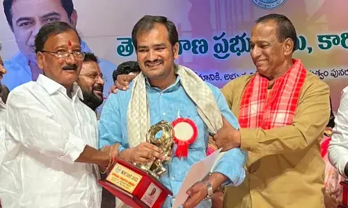 Malla Reddy presents Shrama Shakthi award on Labour Day