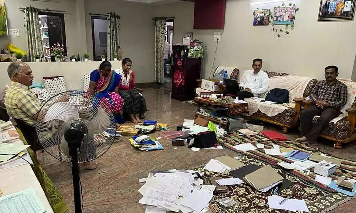 ACB sleuths conducting raids at the house of Assistant Registrar P Sujatha at Sriram Nagar in Kurnool town on Tuesday
