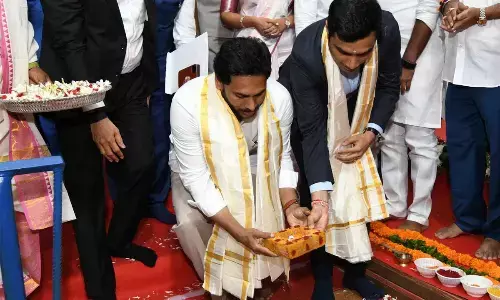 Chief Minister Y S Jagan Mohan Reddy, Rajesh Adani and Karan Adani of Adani Group laying the foundation stone for the Integrated Data Centre at Rushikonda in Visakhapatnam on Wednesday