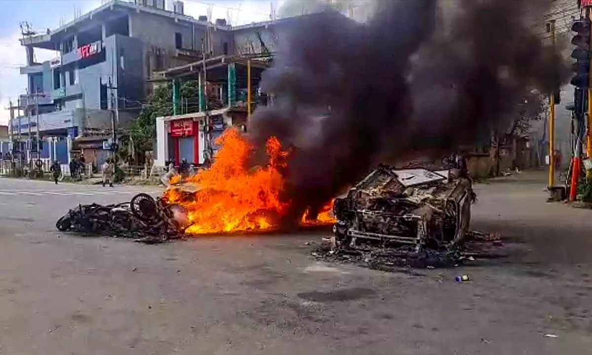 Vehicles in flames after violence broke out during the Tribal Solidarity March called by All Tribal Student Union Manipur (ATSUM), in Imphal on Thursday