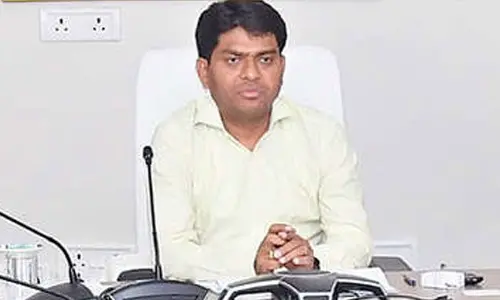 District Collector G Ravi Nayak holding a video conference with officials from his chambers in Mahbubangar on Thursday